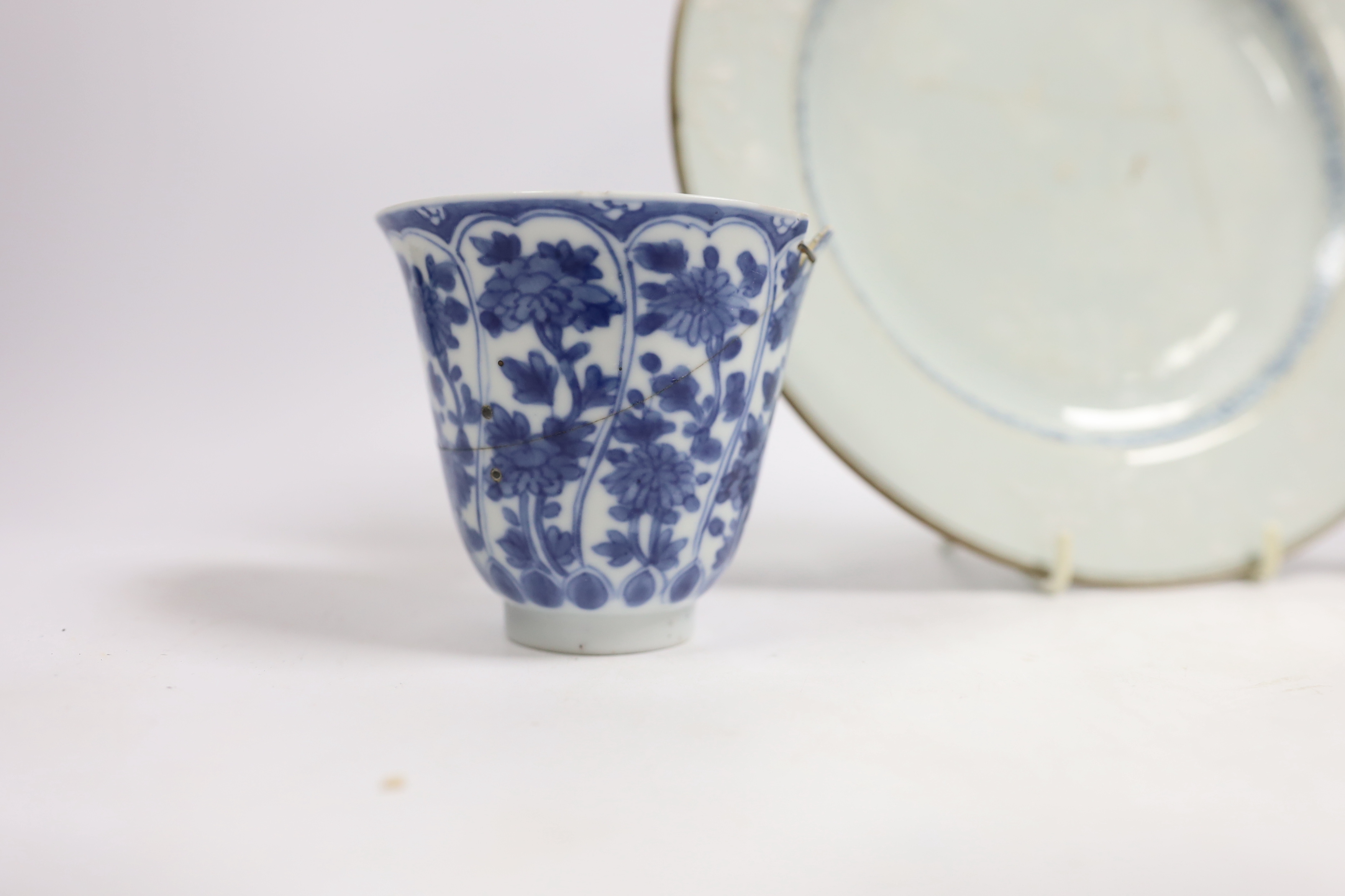 A Chinese bianco sopra bianco plate, diameter 23cm, and two blue and white small pots